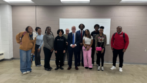 Ron Kincaid standing with students at Central State University in a classroom