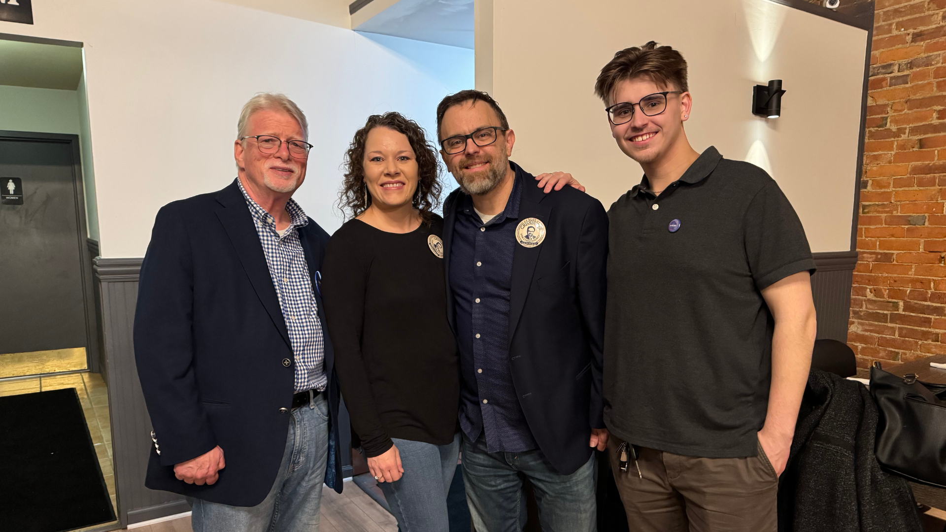 Ron Kincaid standing with Luke Grissinger and his parents